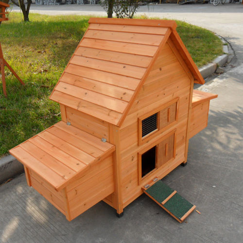 Side view of a compact wooden hen house