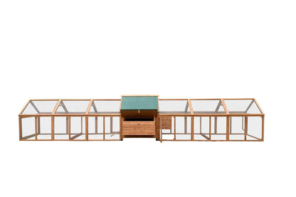 Big chicken coop with run, showing run set up on either side of the coop.